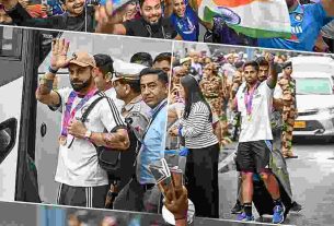 Champions return to country, grand welcome at airport